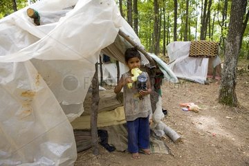Gypsy childs in their camp under a plastic Bulgaria