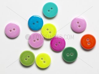 Buttons of colors to 2 holes