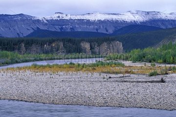 River and snow-covered mountains Yukon Canada