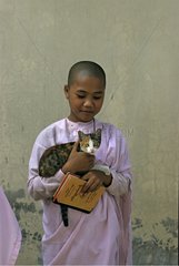 Nun carrying a cat Burma