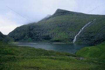 Fjord lanscape in the fog Faroe islands