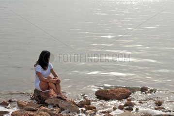 Woman next to a lagoon  in Formentera Balearic Islands