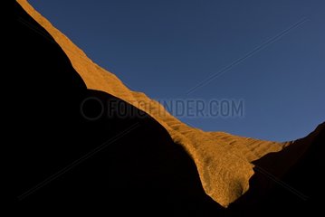 Abstract view of the Ayers rock monolith at sunrise