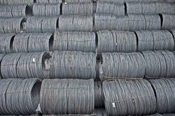 Coils of steel wire stocked in a cargo at harbour France