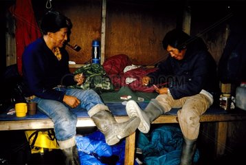 Inuits hunters playing cards Greenland