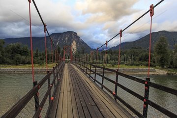 Very narrow metal and wood bridge - Patagonia Chile