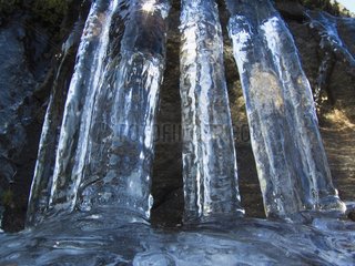 Ice columns forming on a cliff in winter Quebec Canada