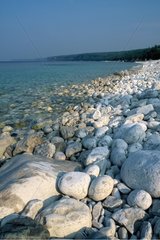 Pebble beach at the edge of Lake Huron in Canada