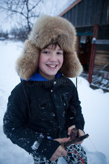 boy with furhead in Finland