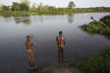 guys taking a shower in the river