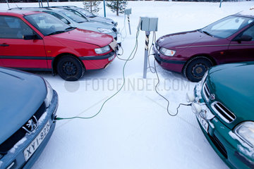 cars being heated by electricty in Finland