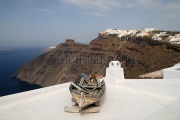 Barque on the roof of a hotel of Santorini to Thira
