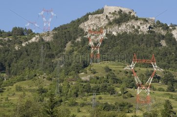 High tension pylons on a mountain Avrieux France