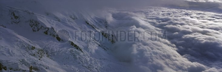 Glacier of Bossons & valley of Chamonix under the clouds
