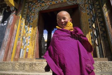 Young novice in front of the monastery of Litangh Kham area
