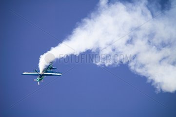 Plane doing acrobatics in flight