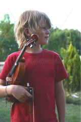 Portrait of kids with his violin France