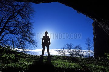Silhouette of a speleologist in Riusec cave Arvas France