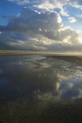 Reflections of clouds at low tide Somme France