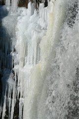 Deroc waterfall frozen in winter Aubrac France