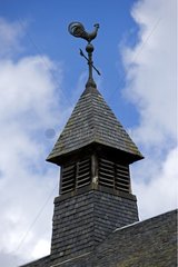 Girouette decorated with a rooster on top of a church France