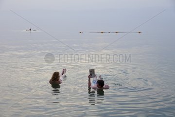 Tourists swimming in the Dead Sea in Jordan
