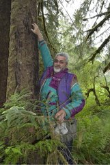 Man and traces of Grizzly claw to 2.35 m high Canada