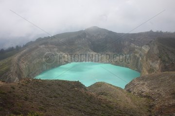 Crater lakes of Keli Mutu volcano in the mist Indonesia