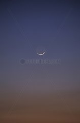 First crescent of Moon suspended in the pure sky Provence