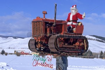 Santa on tractor agricultural property entrance USA