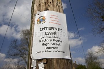Get connected internet cafe notice on telegraph pole Bourton