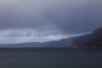 Rainbow sky sea Scotland UK