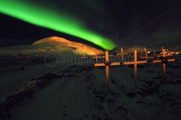 Cemetery Ittoqqorttoormiit and Northern Lights Greenland