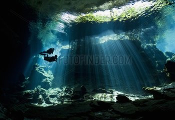 Scuba Divers in the Kukulkan Cenote - Yucatan Mexico