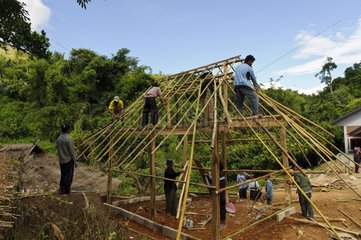 Building a house together Community Akha village Thailand