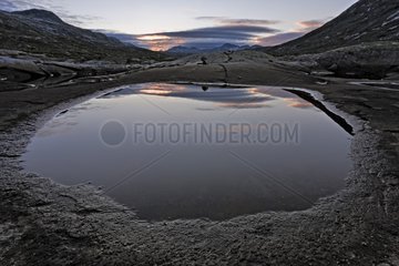 Lake at sunset Area of Jotunheim Norway