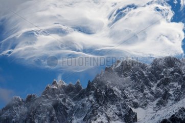 Lenticular clouds over the Aiguilles of Chamonix Alpes