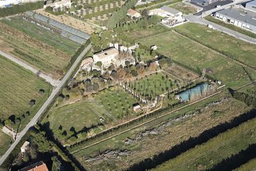 Air shot of a business park and houses Carpentras France