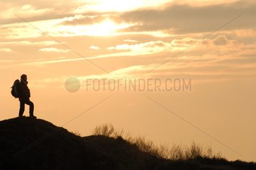 Hiker at sunset Cap-Gris-Nez Calais France