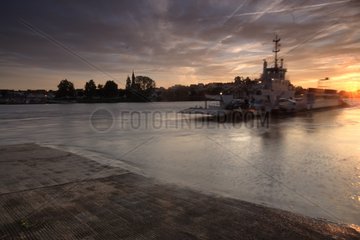Taxi boat of Iles d'Indre docking at sunset France