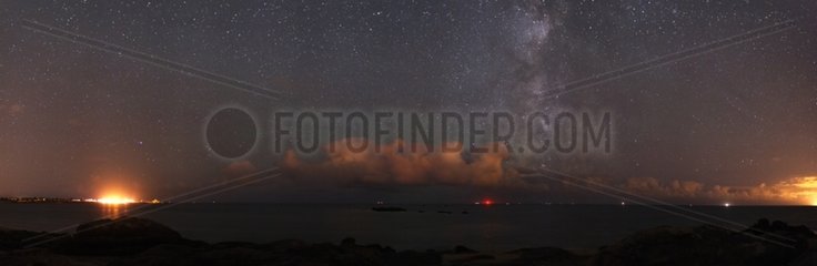 Shooting star in the Milky Way above the sea France
