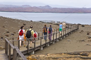 Tourists on boardwalk Bartolome Island Galapagos