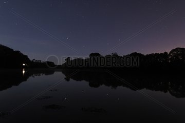 Mars Saturn Castor and Pollux reflected in a river France