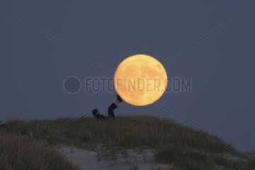Woman giving the feel of the moon with his feet