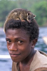Portrait of Boy with animal Witu Islands Bismark Archipelago