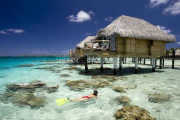 Lagoon and bungalows of Manihi Pearl Beach Resort Tuamotu