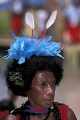 Woman with feather headdress Papua New Guinea