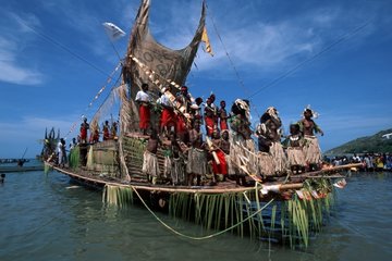 People on big canoe at festival Papua New Guinea