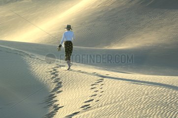 Tourists walking in the desert of Rub al-Khali Abu Dhabi