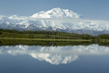 Snowy mountain and its reflection in a lake Denali NP